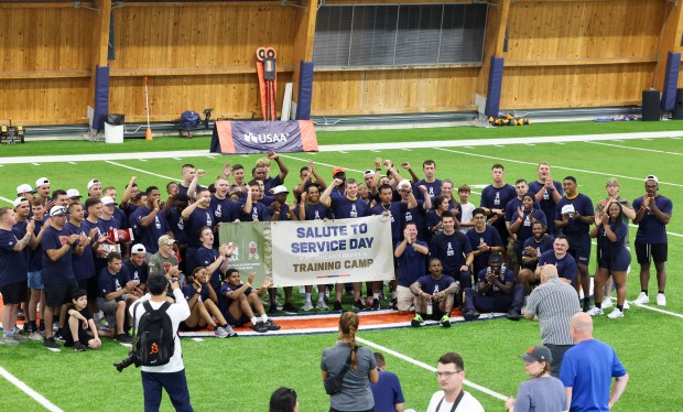 Members of local media pose with Ian Rapoport at the...