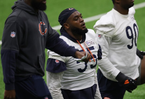 Dayo Odeyingbo (55) works out during the Bears organized team activities in the Walter Payton Center at Halas Hall on May 21, 2025, in Lake Forest. (John J. Kim/Chicago Tribune)