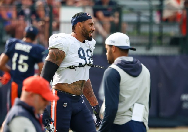 Chicago Bears defensive end Montez Sweat (98) wears a cut off jersey during a very humid and hot training camp on July 29, 2025, in Lake Forest.  (Stacey Wescott/Chicago Tribune)