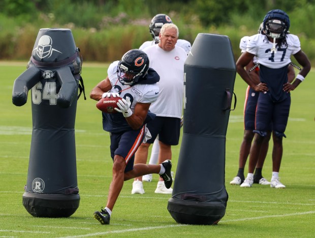 Chicago Bears defensive back Alex Cook (30) catches a pass during training camp at Halas Hall on July 29, 2025, in Lake Forest.  (Stacey Wescott/Chicago Tribune)