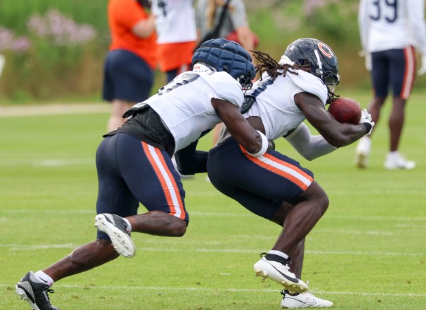 Chicago Bears linebackers Carl Jones Jr. (43)  linebacker Ruben Hyppolite II (47) run through drills during training camp at Halas Hall on July 29, 2025, in Lake Forest. (Stacey Wescott/Chicago Tribune)