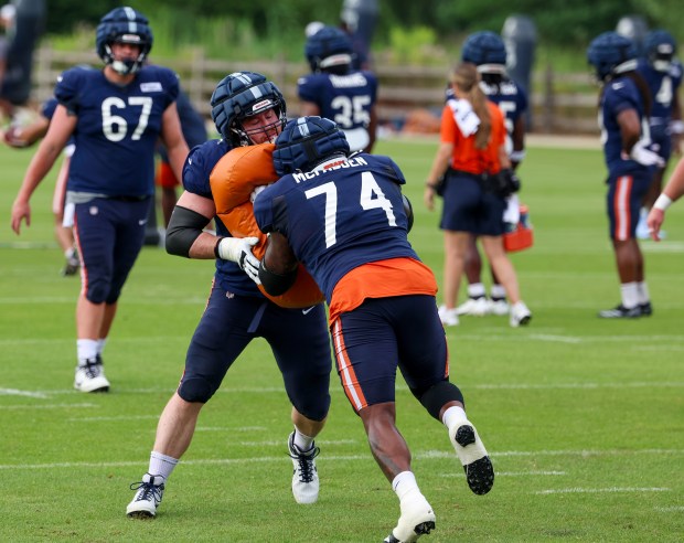 Chicago Bears guards Joe Thuney (62) Jordan McFadden (74) run through blocking drills during training camp at Halas Hall on July 29, 2025, in Lake Forest. (Stacey Wescott/Chicago Tribune)
