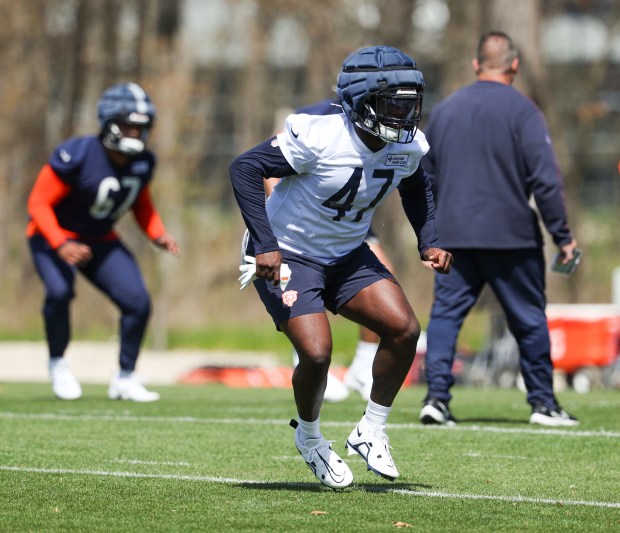 Linebacker Ruben Hyppolite II warms up during Bears rookie camp at Halas Hall on May 9, 2025, in Lake Forest. (Stacey Wescott/Chicago Tribune)