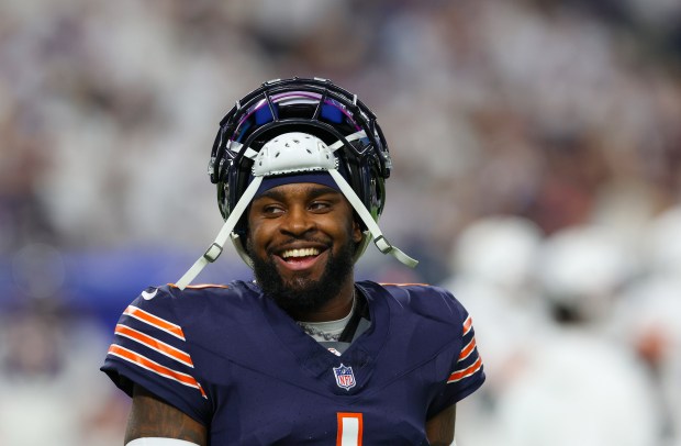 Bears cornerback Jaylon Johnson smiles as he chats with officials during a commercial in the second half against the Viking at U.S Bank Stadium on Dec. 16, 2024, in Minneapolis. (Stacey Wescott/Chicago Tribune)