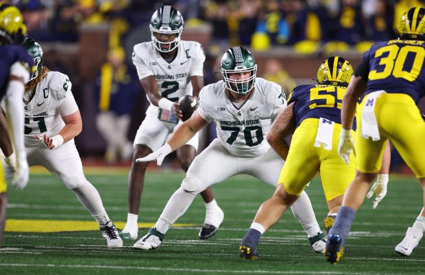 Michigan State guard Luke Newman (70) sets to pass block against Michigan on Oct. 26, 2024, in Ann Arbor, Mich. (Gregory Shamus/Getty Images)