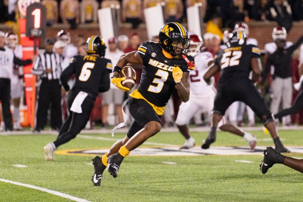 Missouri wide receiver Luther Burden III runs with the ball against Oklahoma on Nov. 9, 2024, in Columbia, Mo. (L.G. Patterson/AP)