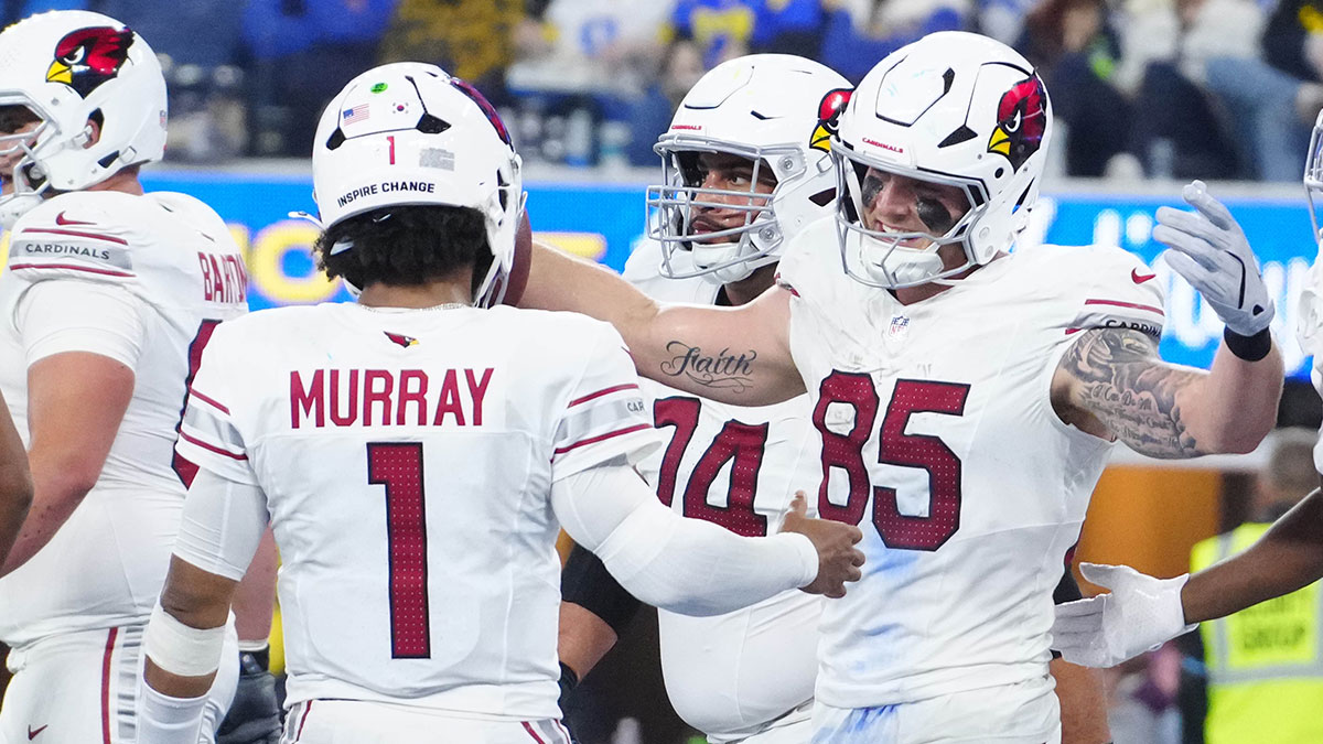 Arizona Cardinals tight end Trey McBride (85) celebrates with quarterback Kyler Murray (1) after catching a 1-yard touchdown pass against the Los Angeles Rams in the second half at SoFi Stadium.