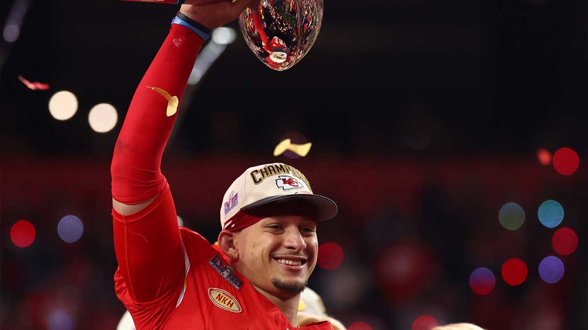 Kansas City Chiefs quarterback Patrick Mahomes (15) celebrates with the Vince Lombardi Trophy after defeating the San Francisco 49ers in Super Bowl LVIII at Allegiant Stadium.