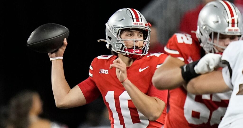 Ohio State true freshman quarterback Julian Sayin attempts a pass during the 2024 season. (Adam Cairns-Imagn Images)