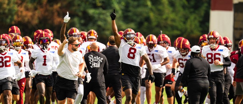 Commanders offense shows excitement at training camp. (Abdullah Konte/The Washington Informer)