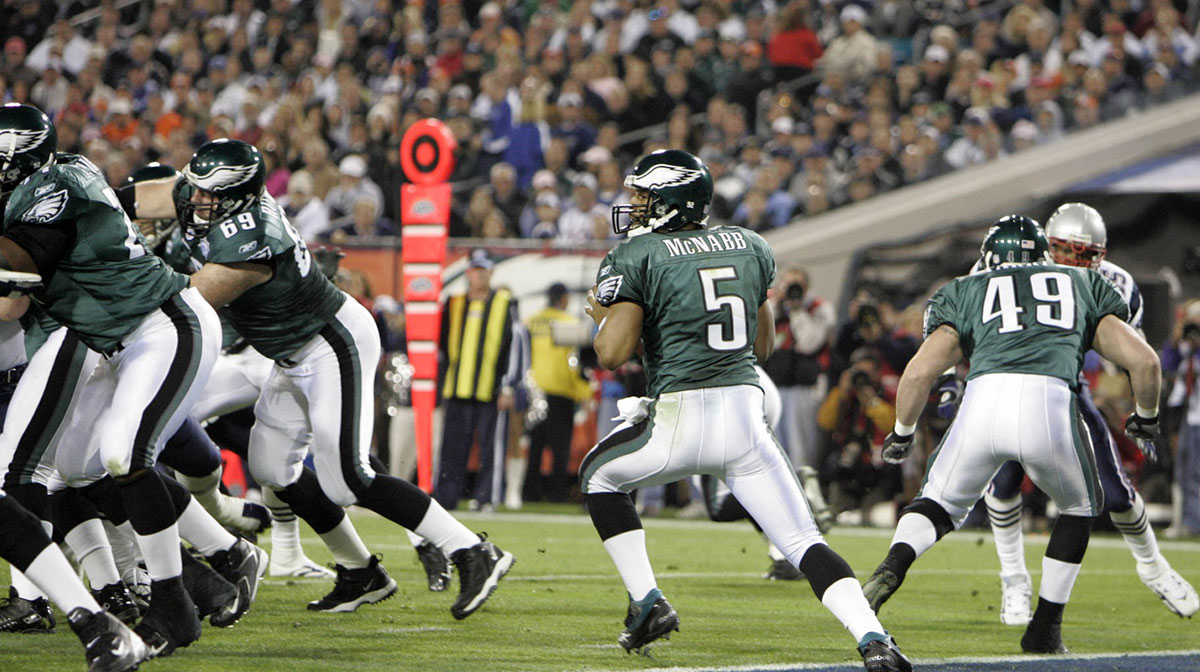 Philadelphia Eagles quarterback Donovan McNabb (5) throws a pass against the New England Patriots during Super Bowl XXXIX at Alltel Stadium. The Patriots won the game 24-21. McNabb was 30 of 51 for 357 yards in the loss. 