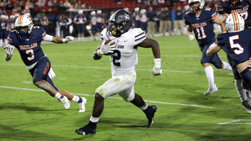 Lone Star player #2, Ashton Jeanty, finds a pocket as he runs for a touchdown during a...