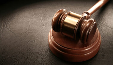 Barred ex-Merrill advisor arrested in alleged $2.6 million theft of Dolphin defender.