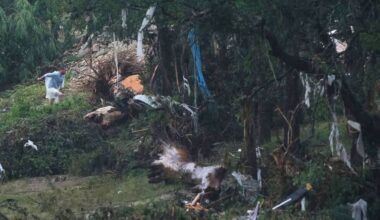 A man surveys damage left by a raging Guadalupe River, Friday, July 4, 2025, in Kerrville, Texas. (AP Photo/Eric Gay)