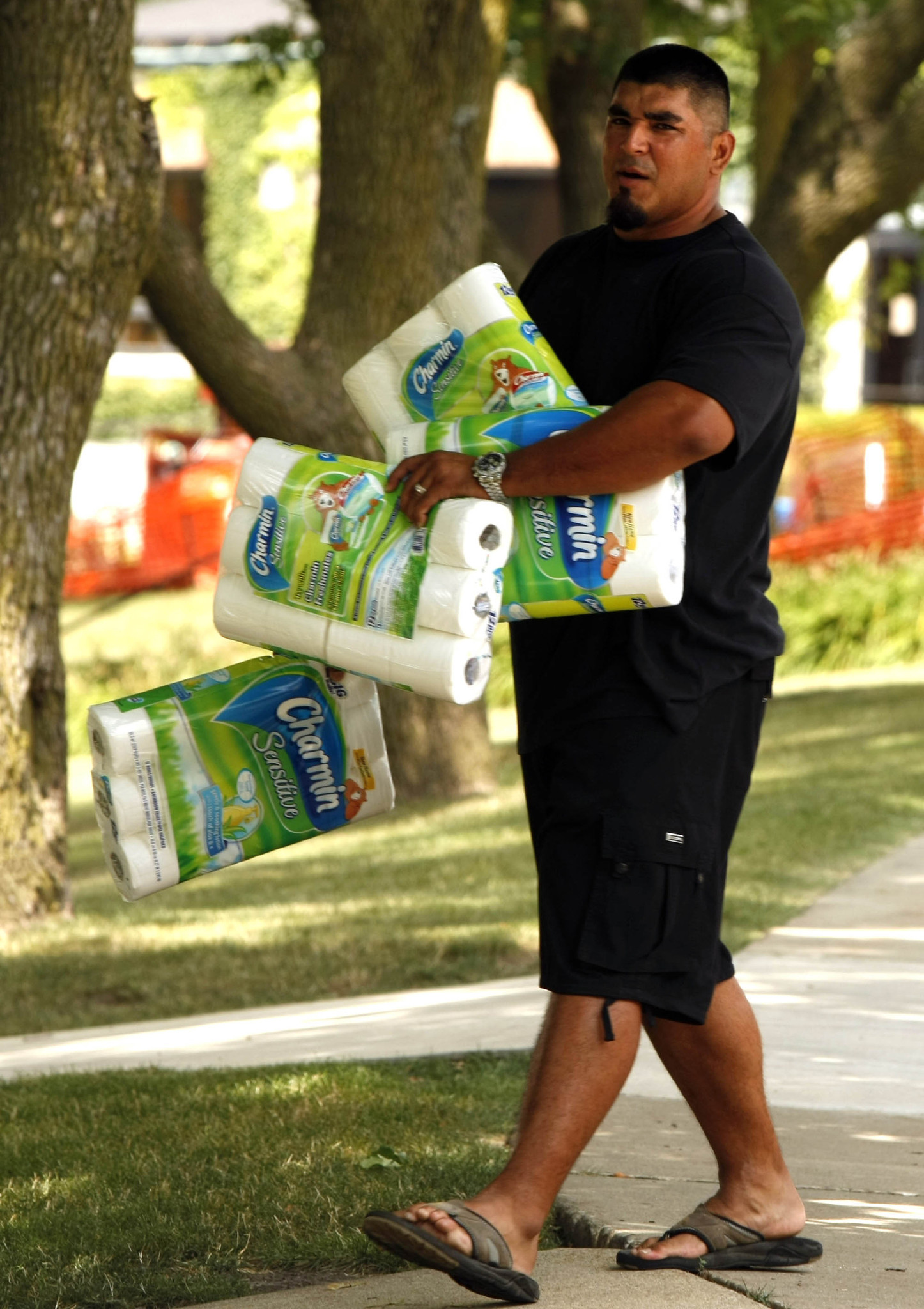 Offensive lineman Roberto Garza arrives with plenty of Charmin.