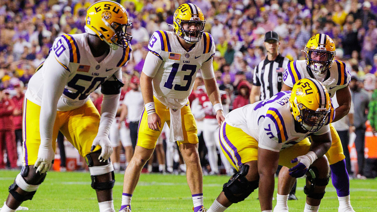 LSU Tigers quarterback Garrett Nussmeier (13) calls for the ball against the Alabama Crimson Tide at Tiger Stadium.