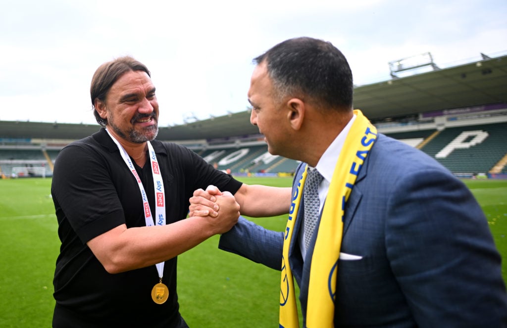Leeds United manager Daniel Farke clasps hands with Paraag Marathe.
