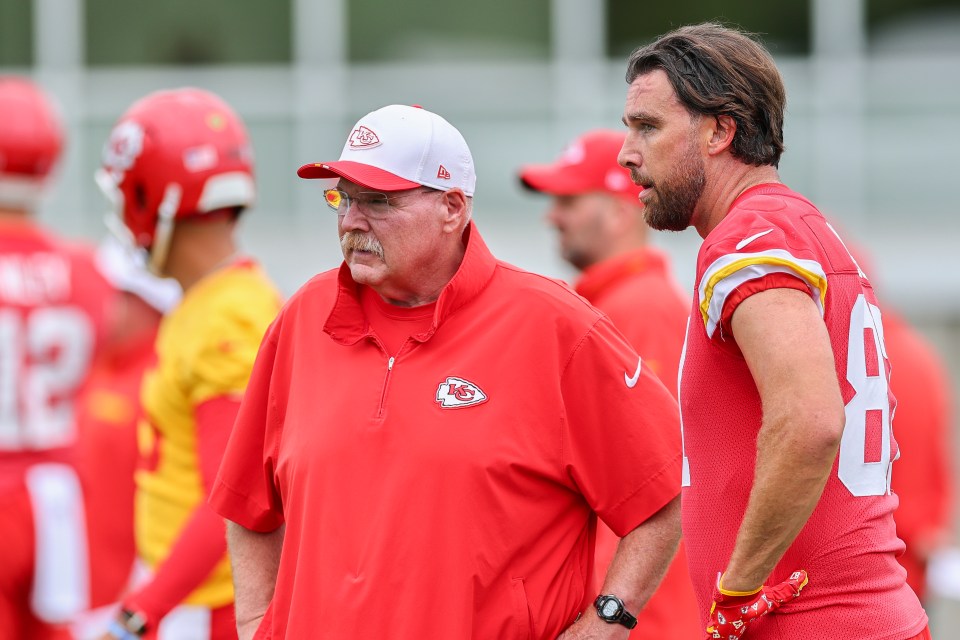 KANSAS CITY, MISSOURI - JUNE 17: Head coach Andy Reid of the Kansas City Chiefs (left) talks with Travis Kelce #87 during minicamp at The University of Kansas Health System Training Complex on June 17, 2025 in Kansas City, Missouri. (Photo by Aaron M. Sprecher/Getty Images)