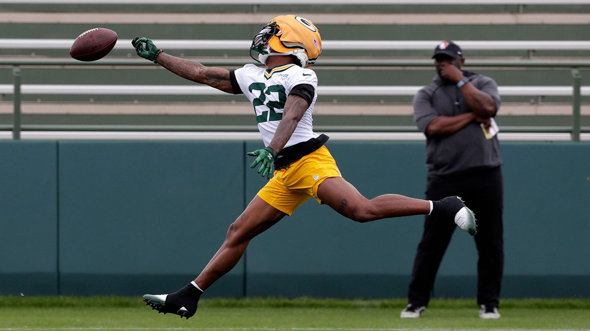 Green Bay Packers wide receiver Matthew Golden (22) misses the ball during the team's first day of minicamp on June 10, 2025, at Ray Nitschke Field in Ashwaubenon, Wis.
