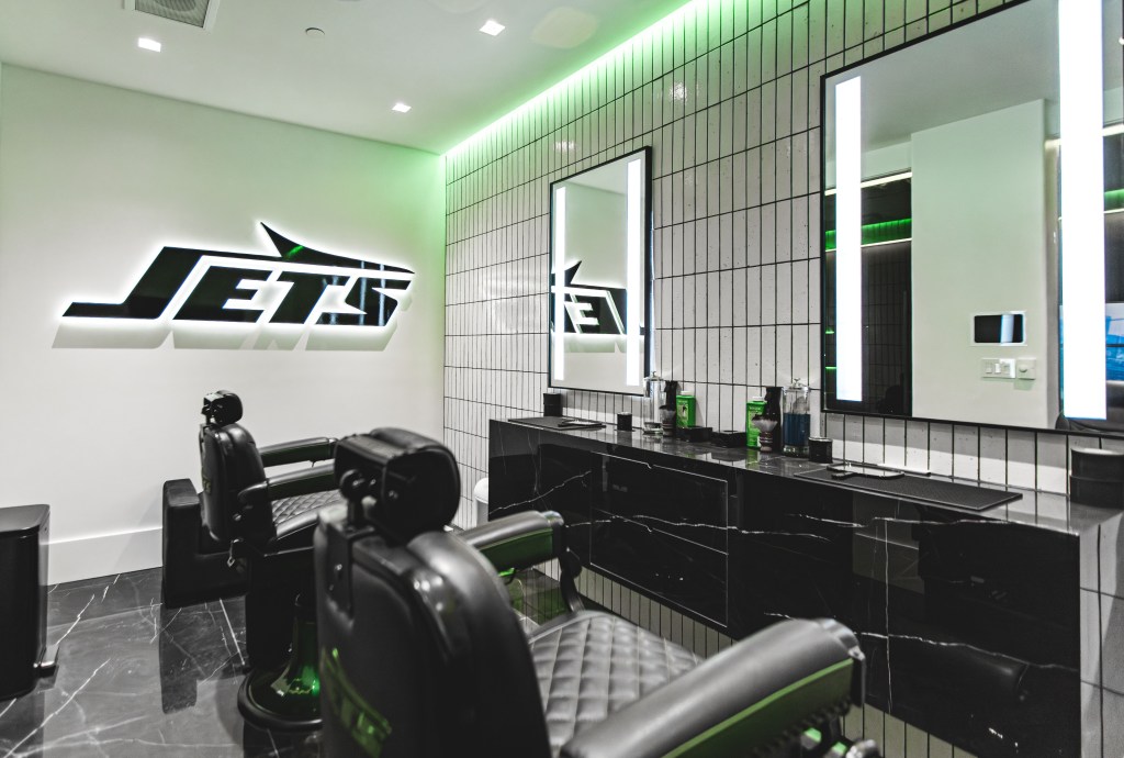 The Jets' new renovated locker room now includes a barber shop.