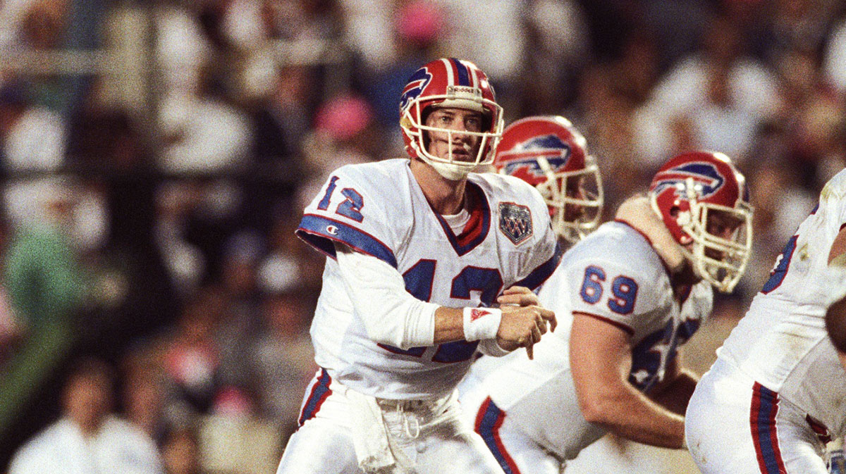 Buffalo Bills quarterback Jim Kelly (12) passes the ball against the New York Giants during Super Bowl XXV at Tampa Stadium. The Giants defeated the Bills 19-20. 