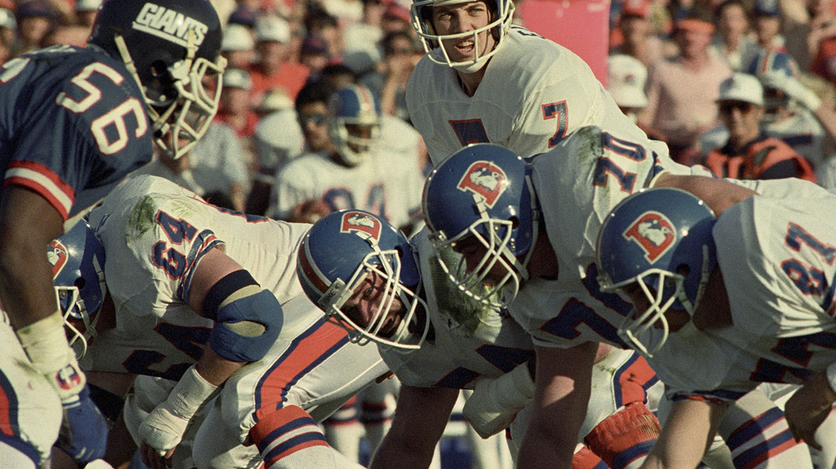Denver Broncos quarterback John Elway (7) lined up under center against the New York Giants during Super Bowl XXI at the Rose Bowl. The Giants defeated the Broncos 39-20. 