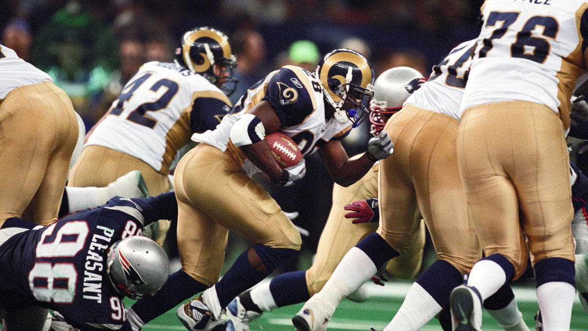 St. Louis Rams running back Marshall Faulk (28) during Super Bowl XXXVI at the Louisiana Superdome. The Patriots defeated the Rams 20-17. 