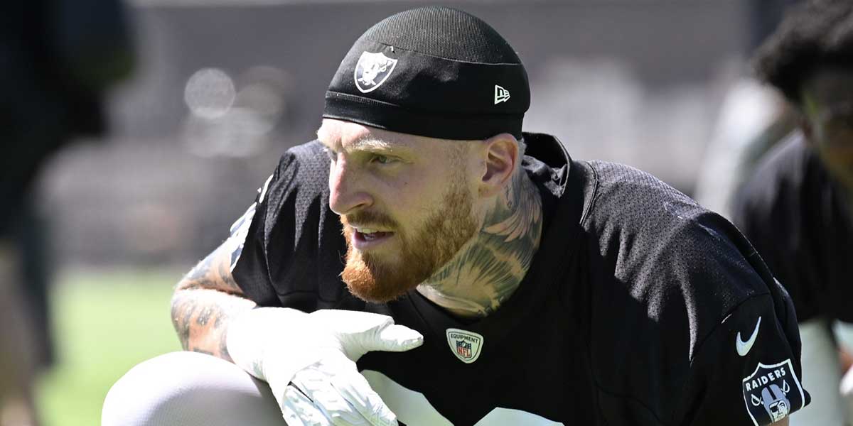 Las Vegas Raiders defensive end Maxx Crosby (98) looks on during the team stretch during Las Vegas Raiders Minicamp at Intermountain Health Performance Center.