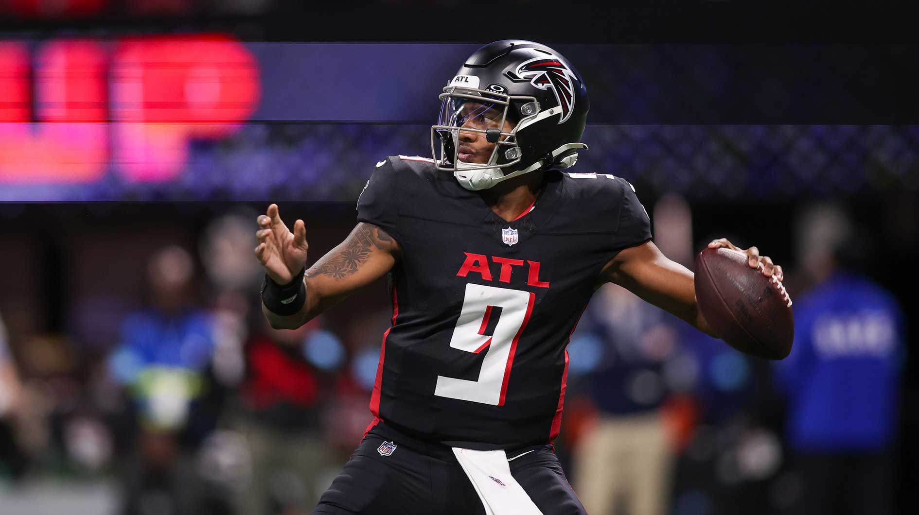 Jan 5, 2025; Atlanta, Georgia, USA; Atlanta Falcons quarterback Michael Penix Jr. (9) throws a pass against the Carolina Panthers in the third quarter at Mercedes-Benz Stadium.
