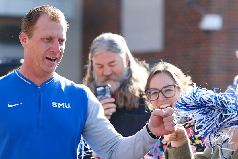 SMU head coach Rhett Lashlee greets the fans during a send-off party for the football team...