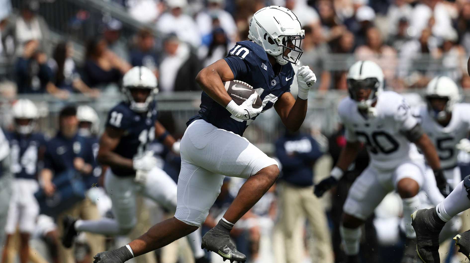 Penn State Nittany Lions running back Nicholas Singleton (10) runs with the ball during the second quarter of the Blue White spring game at Beaver Stadium. The White team defeated the Blue team 10-8.