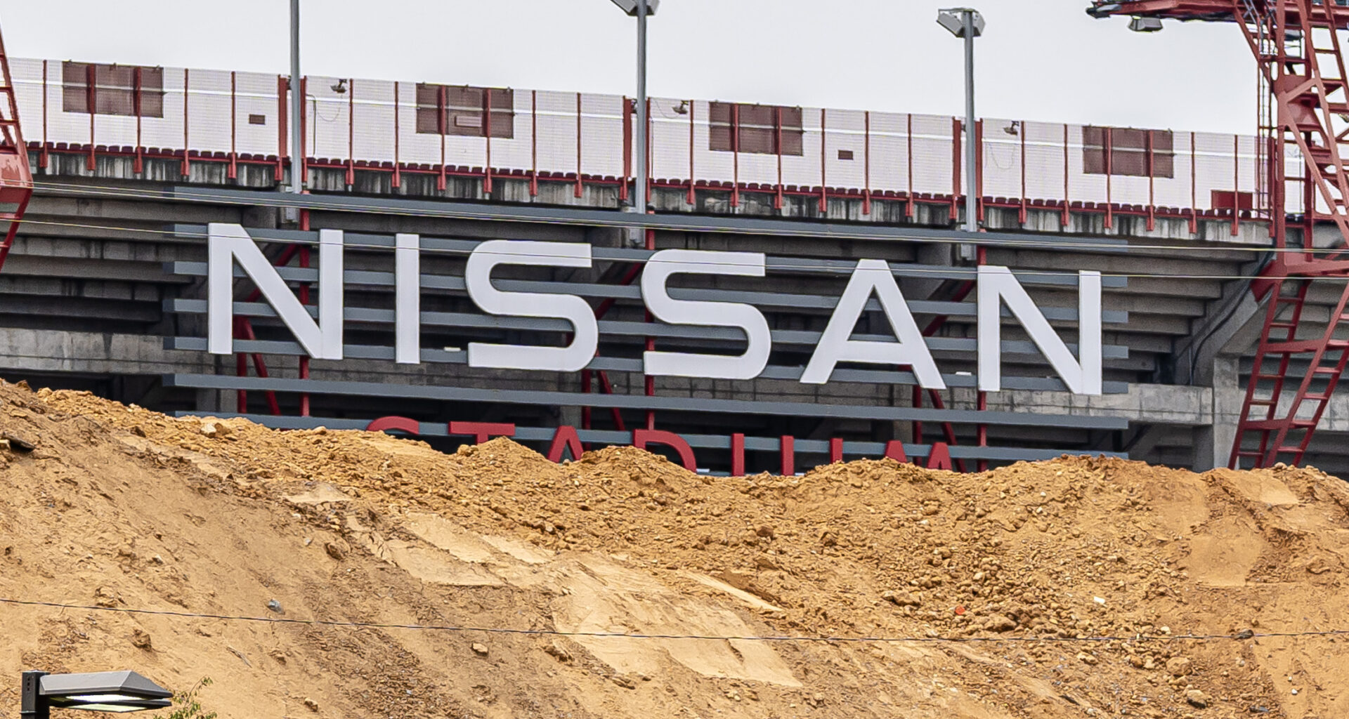 Dirt from future enclosed Nissan Stadium is sent to landfill