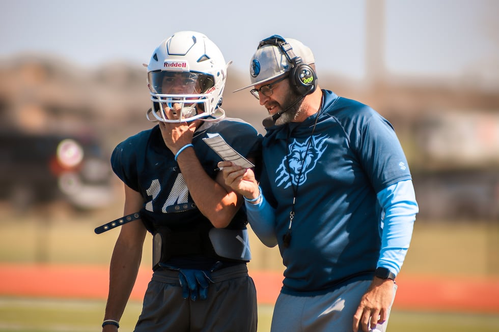 Reid Macon and Jeff Lyles at West Plains football practice.