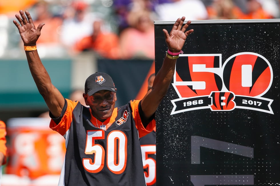 Former Cincinnati Bengals cornerback Lamar Parrish waves to the crowd during a halftime 50th...