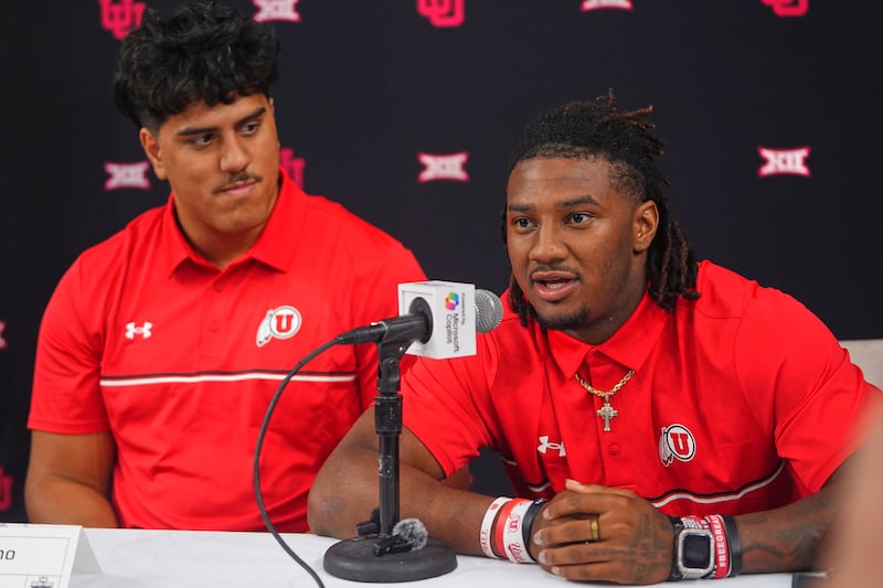 Utah quarterback Devon Dampier, right, speaks as teammate offensive lineman Spencer Fano looks on during the Big 12 football media days in Frisco, Texas, Wednesday, July 9, 2025.