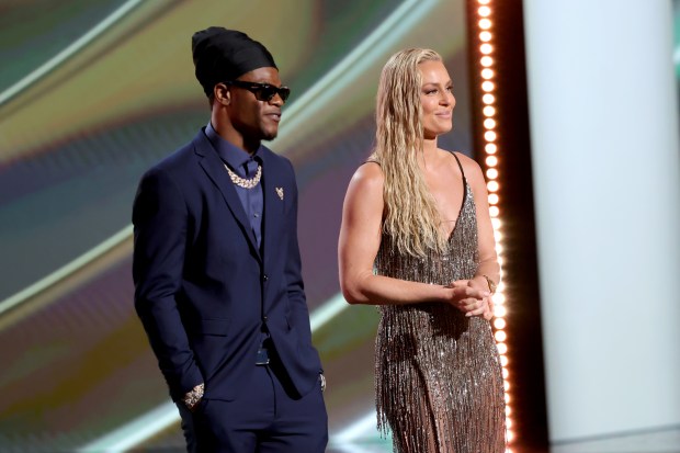 (L-R) Lamar Jackson and Lindsey Vonn speak onstage during the 2025 ESPY Awards at Dolby Theatre on July 16, 2025 in Hollywood, California. (Photo by Kevin Winter/Getty Images)