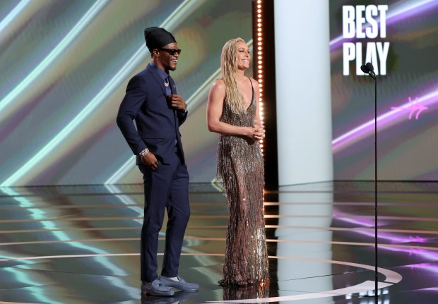 (L-R) Lamar Jackson and Lindsey Vonn speak onstage during the 2025 ESPY Awards at Dolby Theatre on July 16, 2025 in Hollywood, California. (Photo by Kevin Winter/Getty Images)