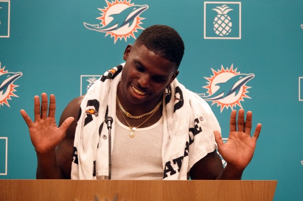 Miami Dolphins wide receiver Tyreek Hill speaks during a news...