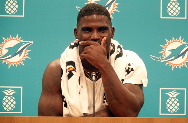 Miami Dolphins wide receiver Tyreek Hill speaks during a news...