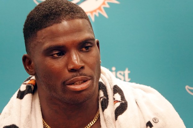 Miami Dolphins wide receiver Tyreek Hill speaks during a news...