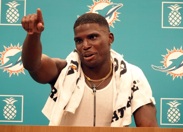 Miami Dolphins wide receiver Tyreek Hill speaks during a news...