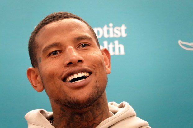 Miami Dolphins tight end Darren Waller speaks during a news...