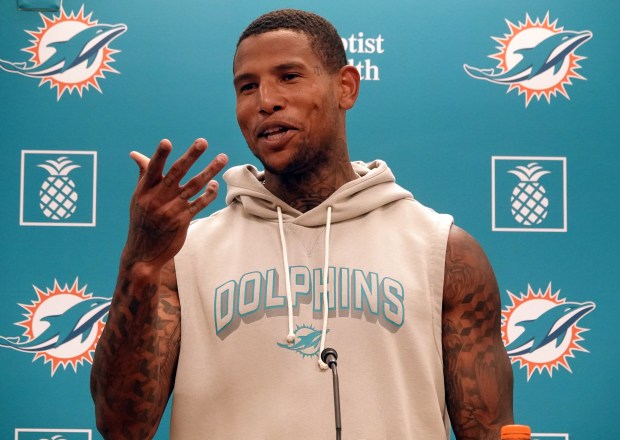 Miami Dolphins tight end Darren Waller speaks during a news...