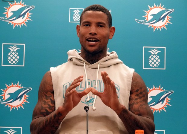 Miami Dolphins tight end Darren Waller speaks during a news...
