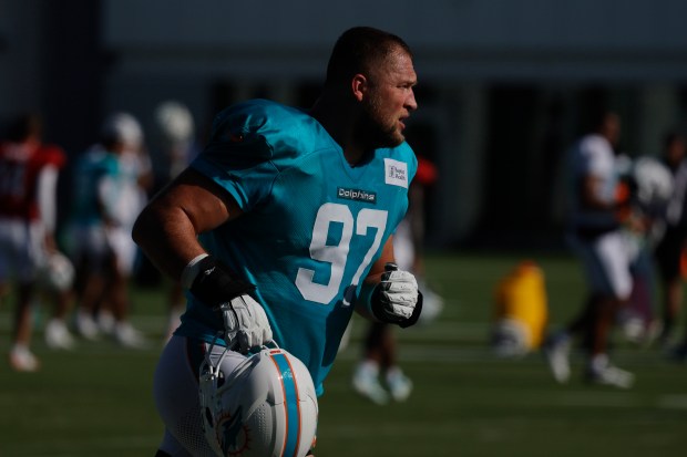 Miami Dolphins Ben Stille runs during practice Tuesday, July 29,...
