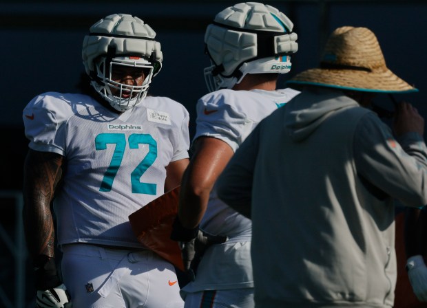 Miami Dolphins rookie guard Jonah Savaiinaea (72) is seen during...