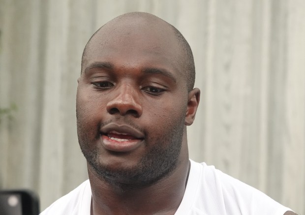 Miami Dolphins guard James Daniels (78) speaks to the media...