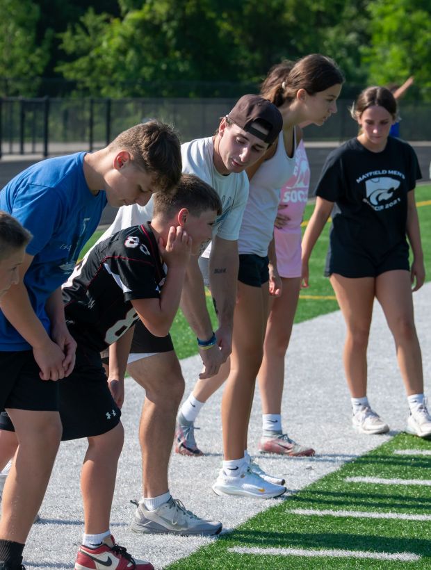 Browns wide receiver Luke Floriea of Mentor instructs campers during the second annual Andy Isabella Camp at Mayfield's Wildcat Stadium July 3. (Paul DiCicco - For The News-Herald)