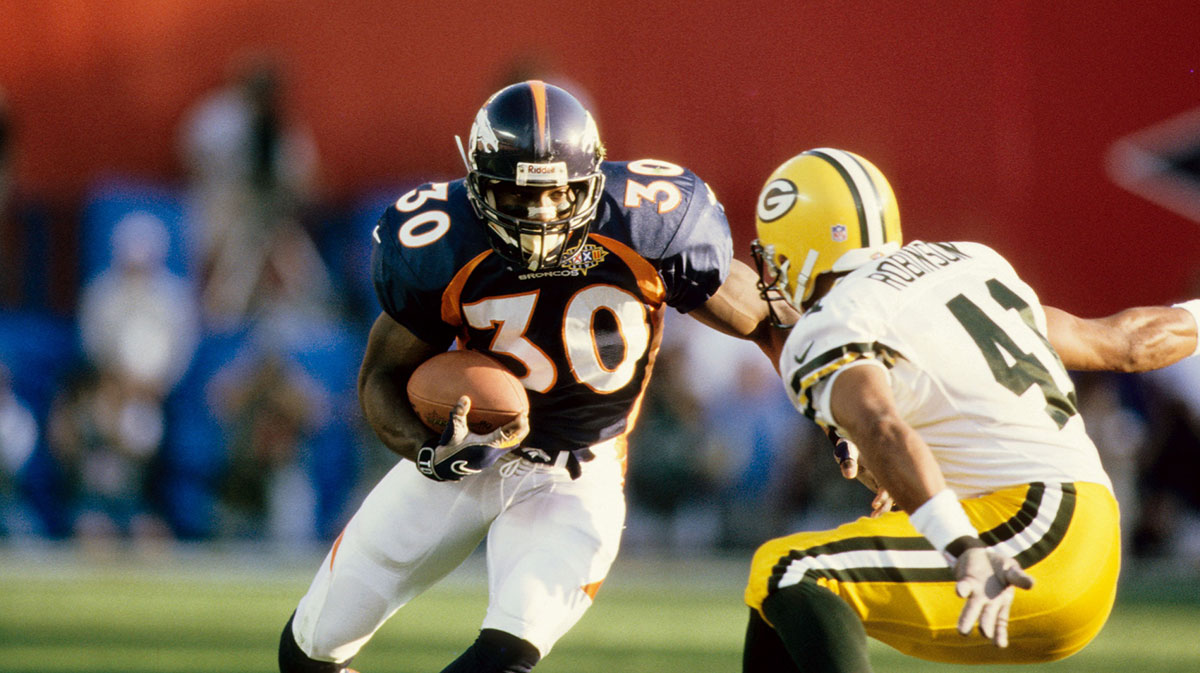 Denver Broncos running back #30 Terrell Davis in action against the Green Bay Packers during Super Bowl XXXII at Qualcomm Stadium. Davis rushed for 157 yards and was named the games most valuable player. The Broncos defeated the Packers winning their first Super Bowl Title 31-24. 