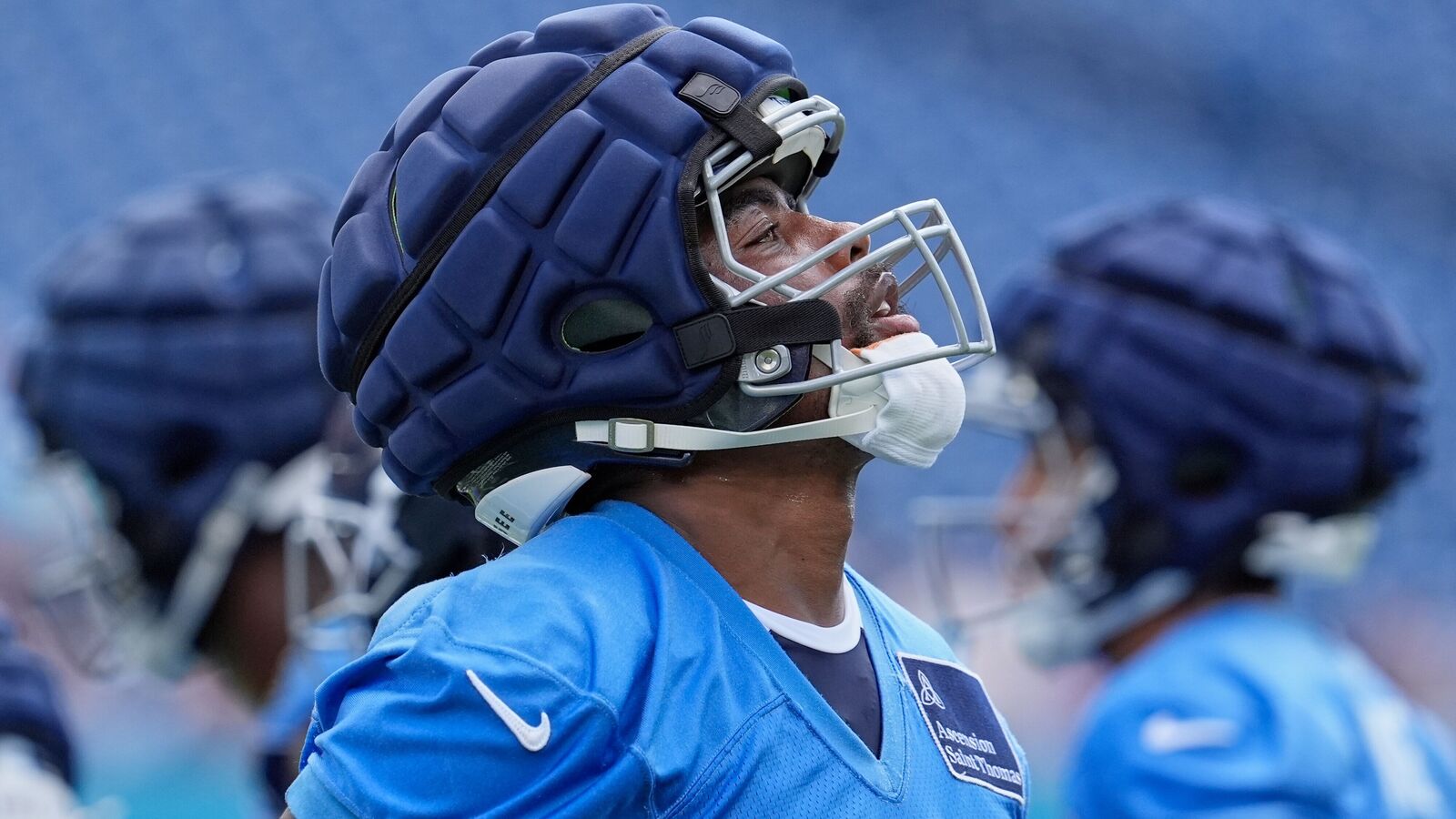 Tennessee Titans wide receiver Treylon Burks (16) looks up during Back Together Weekend at the team's NFL football training camp.